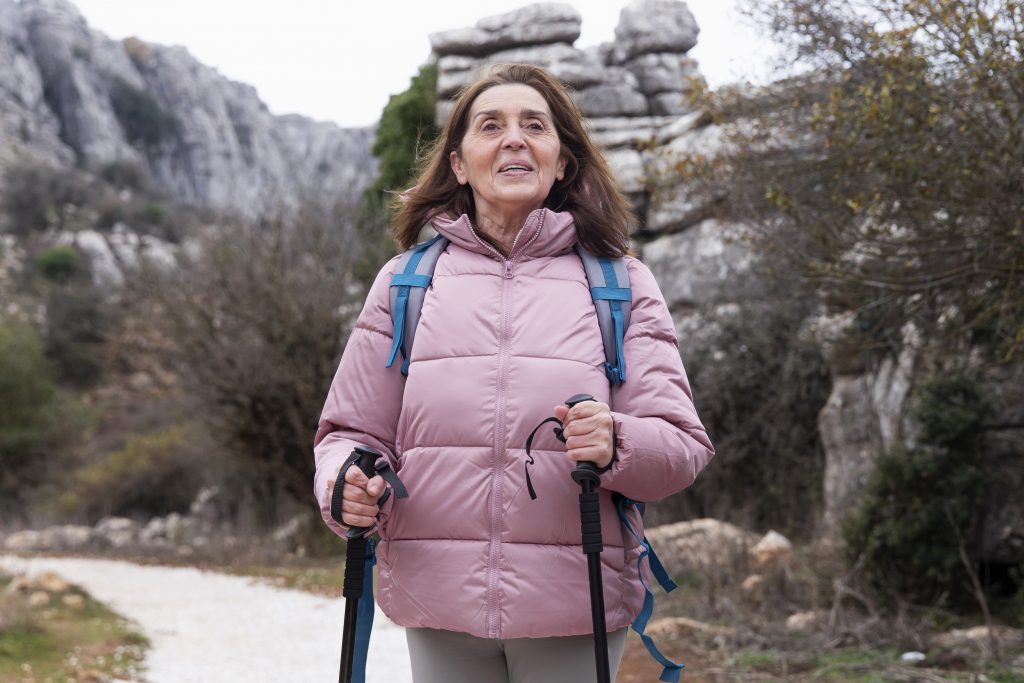 medium-shot-smiley-senior-woman-hiking-1024x683-1